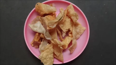 Crispy Fried Dumpling Skin Chips, an authentic Indonesian snack Video stock 324549513