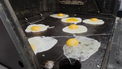 Crispy Fried Eggs on Toast Being Prepared Stock Footage 347627595