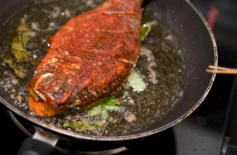 Crispy Fried Fish in Pan Stock Photos