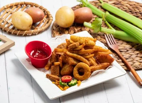 Crispy Fried Food Platter include french fries, onion rings, chicken nugget.. Stock Photos