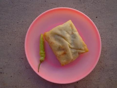 Crispy fried martabak stuffed with egg and spring onion Photos