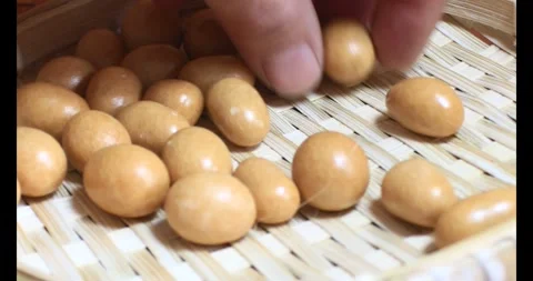 Crispy fried peanuts Stock Footage 296483990