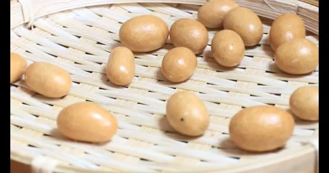 Crispy fried peanuts Stock Footage 296484047