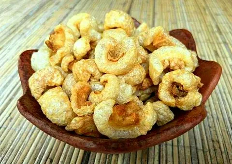 Crispy fried pork skin mixed with seasoned flour Stock Photos