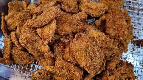 Crispy Fried Pork Skin Street Food Close Up Crunchy Texture Thailand 4K Stock Footage 332340887