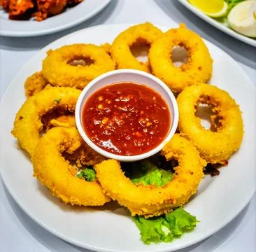 Crispy Fried Squid Rings with Sauce for Premium Seafood Food Object and App.. Stock Photos