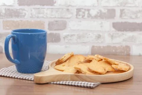 Crispy Garlic Bread and cup of coffee Stock-Fotos