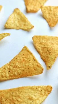 Crispy Golden Triangle Corn Chips Close Up Snack Texture Background Stock Photos