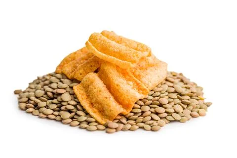Crispy lentil chips isolated on white background. Stock Photos