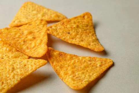 Crispy nacho chips ready for dipping and sharing during a cozy gathering Stock Photos