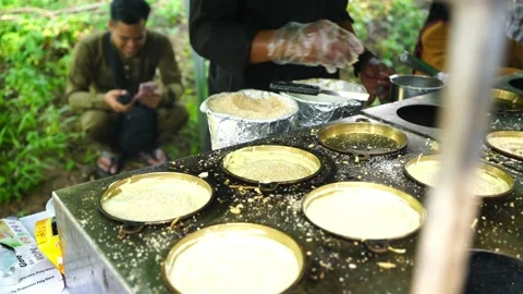 Crispy Peanut Pancake in the making Stock Footage 146133399