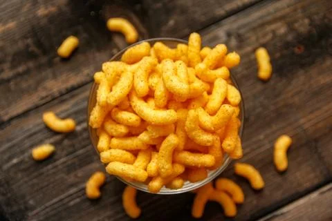 Crispy peanut puffs or flips snacks Stock Photos