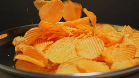 Crispy potato chips. Golden fried potatoes snack for unhealthy fast food. S.. Stock-Footage 325635308