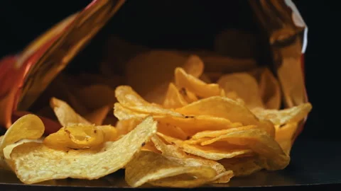 Crispy Potato Chips in a Pack Swirl Close-up Stock Footage 263575519