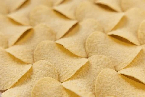 Crispy potato chips seamless pattern background texture Stock Photos