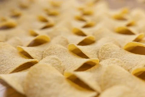 Crispy potato chips seamless pattern background texture Stock Photos