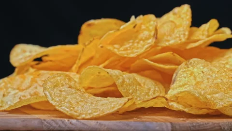 Crispy Potato Chips Swirling Close-up Stock Footage 265004599