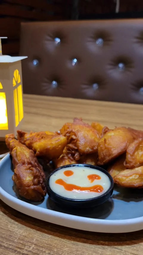 Crispy Potato Wages with a White Stand Lamp. Stock Footage 285621799
