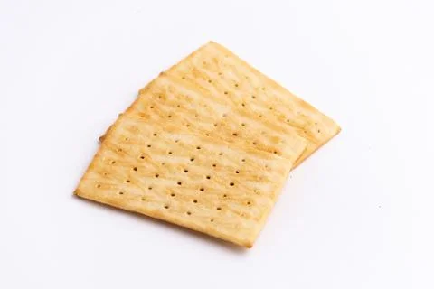 Crispy rectangular cheese crackers biscuits isolated on a white background Stock Photos