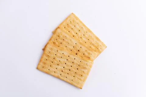 Crispy rectangular cheese crackers biscuits isolated on a white background Stock Photos
