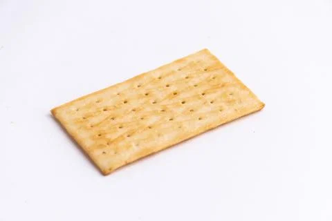 Crispy rectangular cheese crackers biscuits isolated on a white background Stock Photos