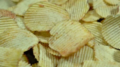 Crispy Ridge Pattern on Fried Potato Snacks Macro Detail Shot. Stock Footage 332458869