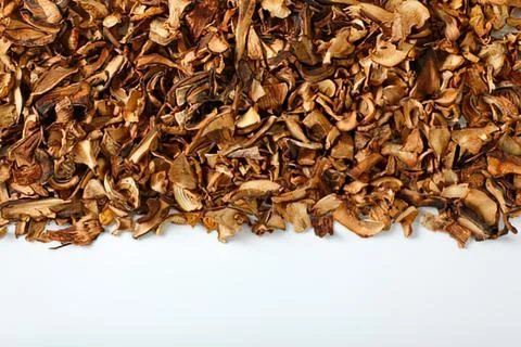 Crispy roasted potato chips with herbs Stock Photos