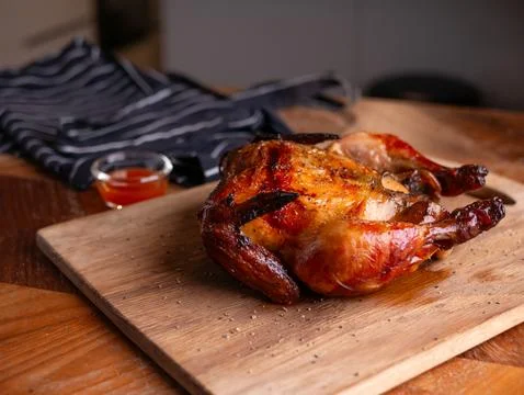 Crispy Roasted Whole Chicken Close-Up. Stock-Fotos