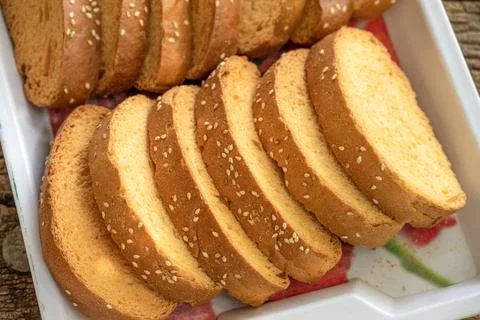 Crispy rusk, Biscuits cake rusk over wooden background , a crunchy snack in.. Foto stock