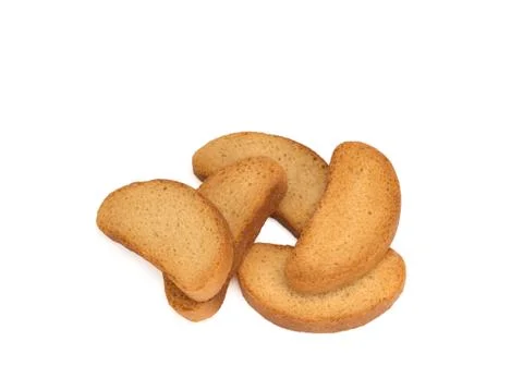 Crispy rusks on white background Stock Photos