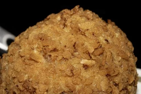 Crispy Scotch Egg Batter Fried Golden Close up with runny yolk Stock Photos