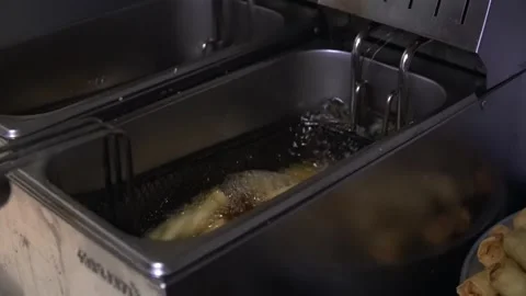 Crispy Snacks Being Fried Stock Footage 319949488
