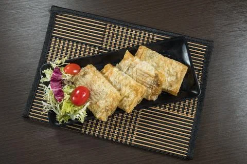 Crispy Spring Rolls On Black Plate Stock Photos