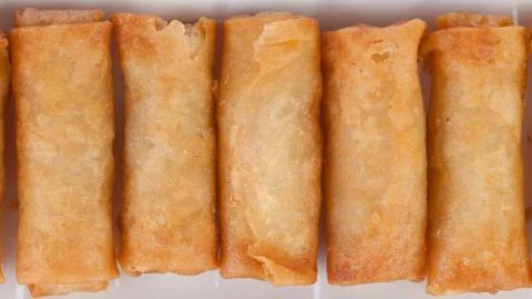 Crispy spring rolls on white dish with Sweet &amp; Sour Sauce. Stock Photos