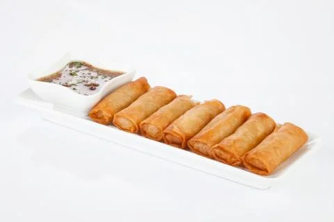 Crispy spring rolls on white dish with Sweet &amp; Sour Sauce. Stock Photos