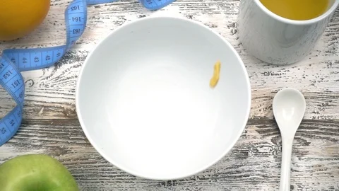Crispy tasty yellow corn flakes falling. Stock Footage 87009905