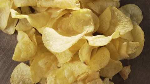 Crispy thin potato chips close-up on a dark background Stock-Footage 135066953