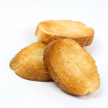 Crispy toasts on white Stock Photos
