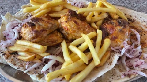 Crispy Turkish Style Roasted Chicken with Golden French Fries Stock Footage 345522054