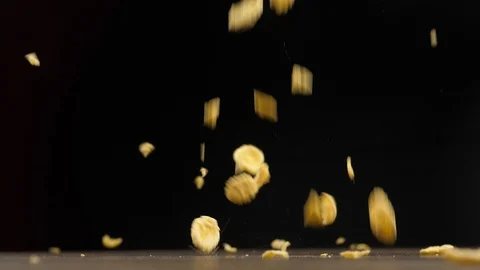 Crispy yellow corn flakes fall down Stock Footage 111267614