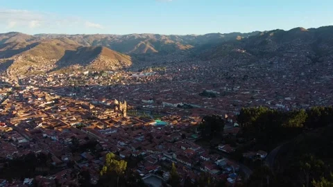 Cristo blanco statue overlooking cusco cityscape at sunset in peru Stock Footage 346568441