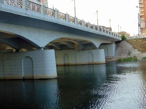 Crisul Repede river and a bridge in Oradea city Фото