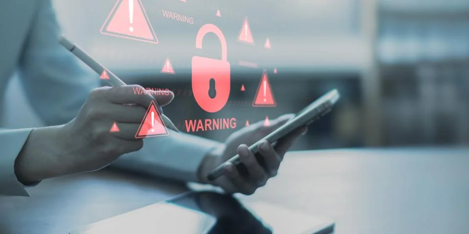Critical Cybersecurity Breach Warning with Data Protection Risks. Stock Photos
