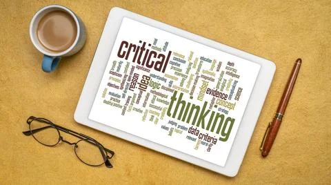 Critical thinking word cloud on tablet Stock Photos