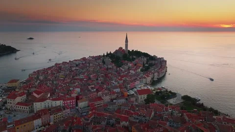 Croatia - 4K flying around the Old Town of Rovinj at sunset with golden sky Stock Footage 278730967
