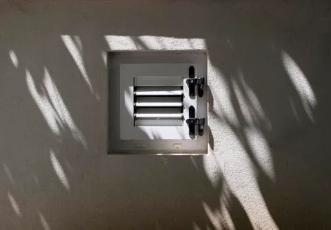 Croatia, Closed window with shadow on built structure at Baska town Stock Photos