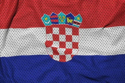 Croatia flag printed on a polyester nylon sportswear mesh fabric Stock Photos