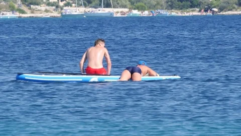 Croatia, Marina, Split-Dalmatia, August 21, 2019. Two young boys have fun Stock Footage 124498024