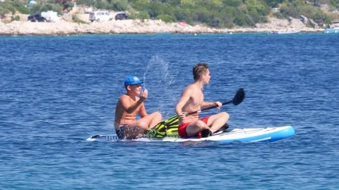 Croatia, Marina, Split-Dalmatia, August 21, 2019. Two young boys have fun 库存影片 124687350