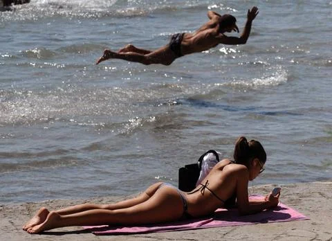  Croatia, Split, 070912. Split s Bacvice, as usual, does not stop offering... Stock Photos